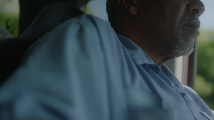 Man driving a vehicle and coughs