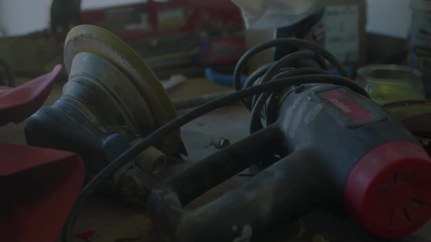 Power tools sitting on a workbench