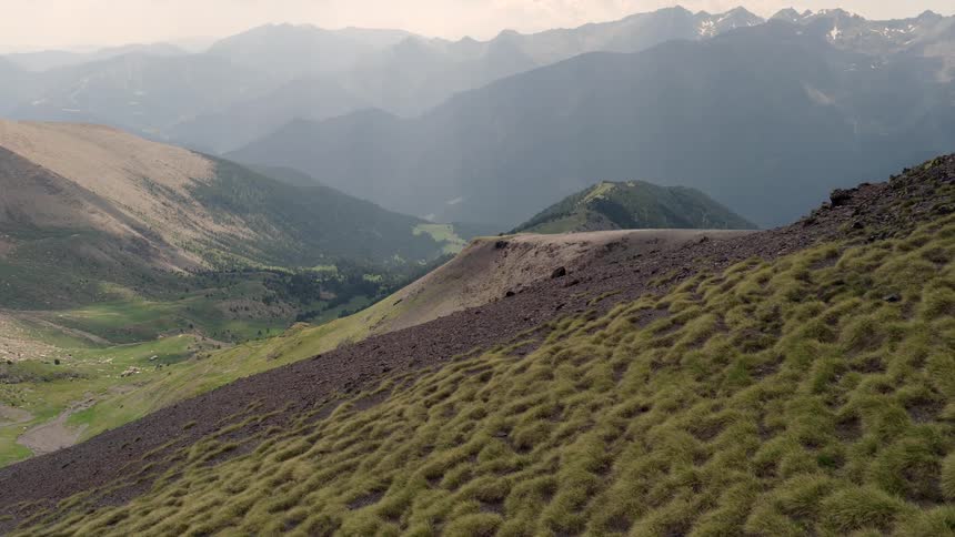 The terrain in a mountain range changes with the elevation