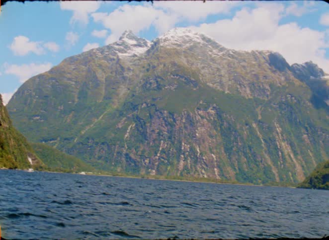 The mountains are surrounded by water