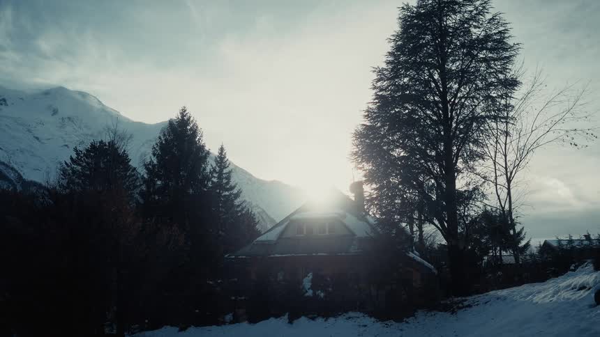 A view of some mountains covered in snow