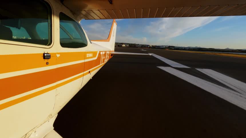 Cessna skyhawk aircraft taxiing on runway for takeoff