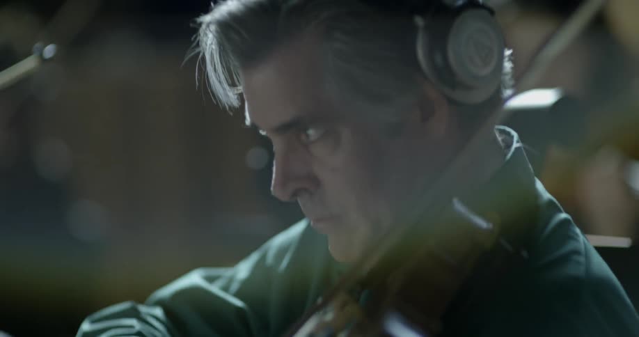 People are playing musical instruments together