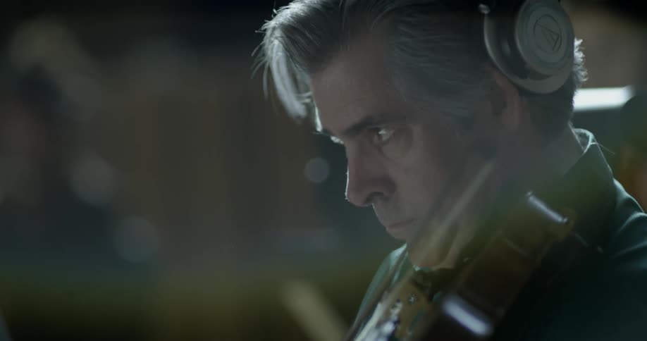 A man plays the violin