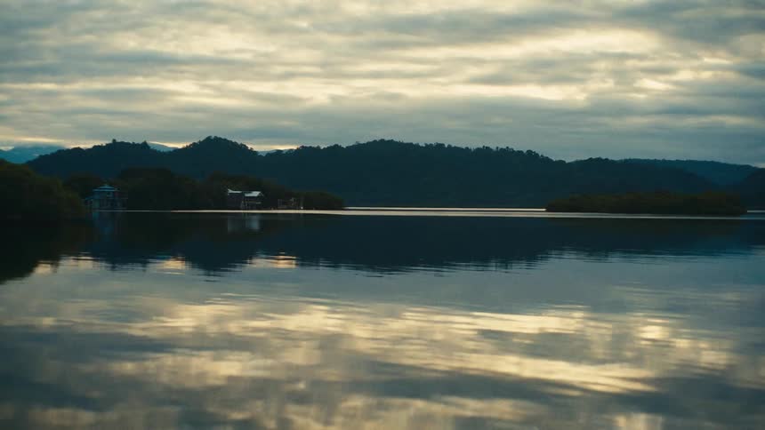 The clouds reflect on the lake water