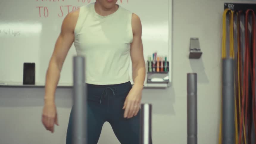 A woman doing exercises in a gym