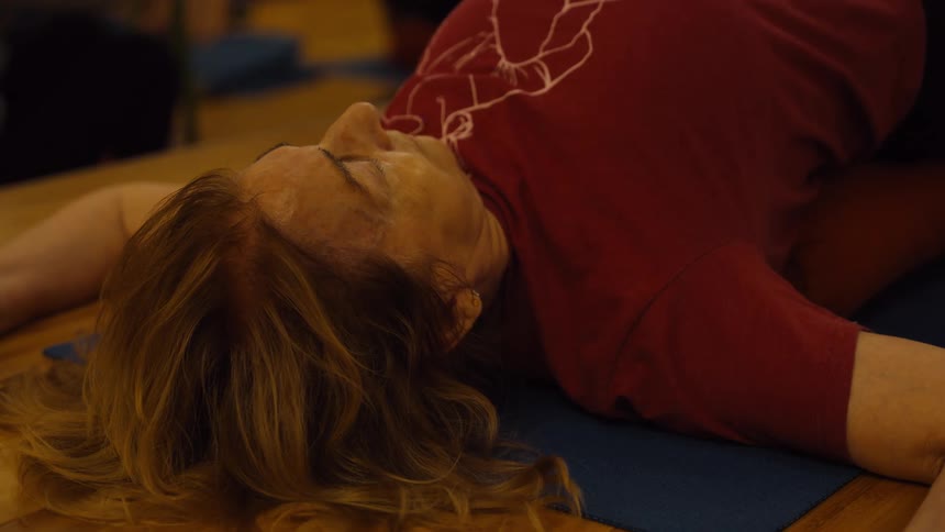 Woman lying down sleeping