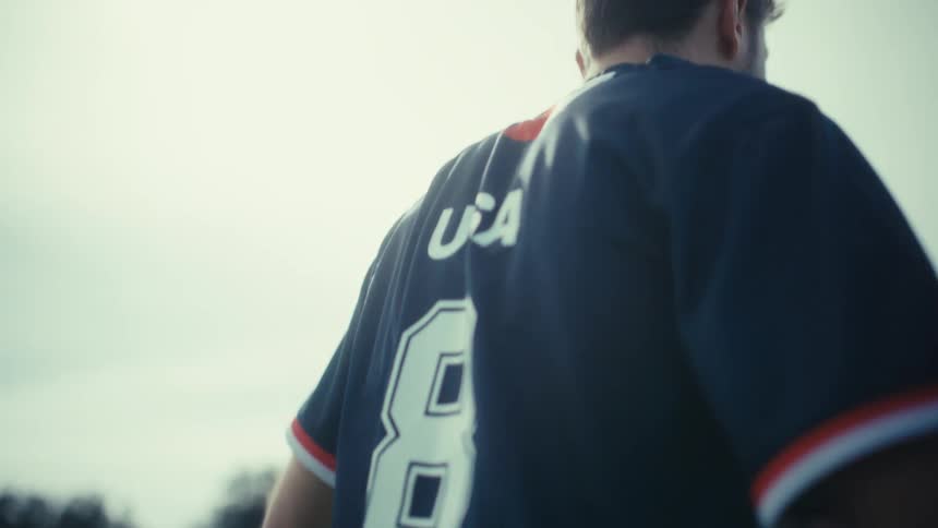 Two soccer players cheering