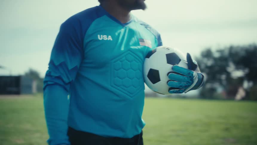 Two people playing soccer