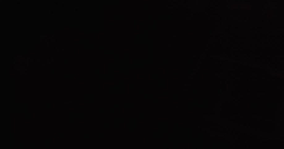 A blinking light illuminates the many components on a circuit board