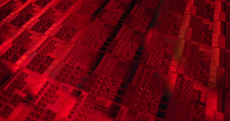 Microchip surface with multiple electronic blocks and circuits in a colorful geometric pattern