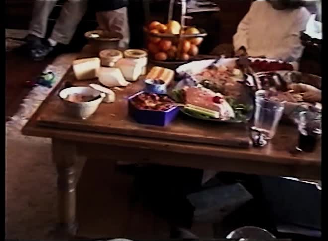 Rustic table with assorted foods arranged