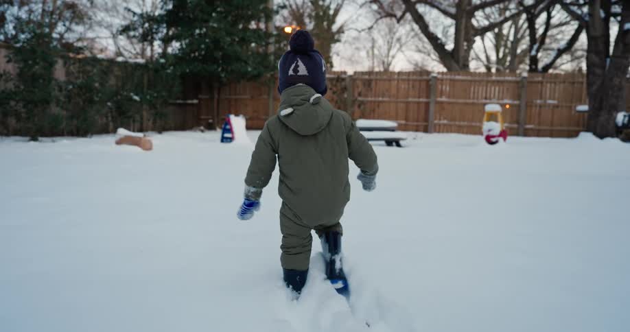 A child walking in the snow