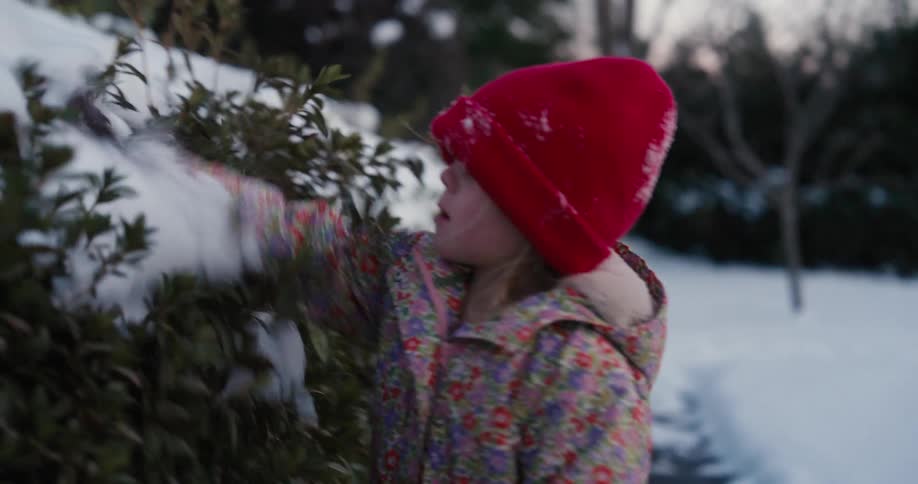 Two children playing in the snow
