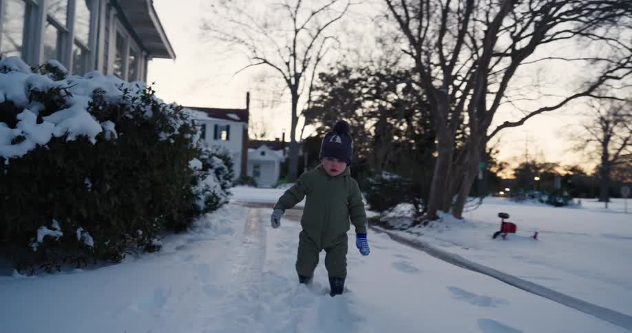 A child walking in the snow