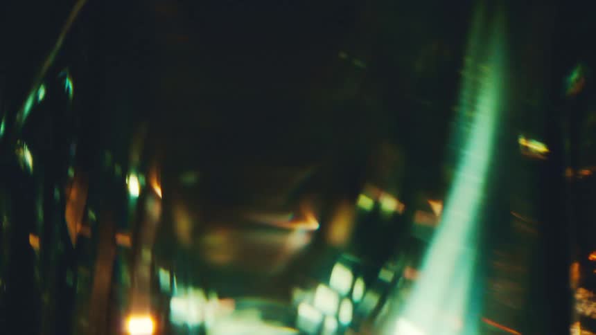 Light reflect off a golden items at night time