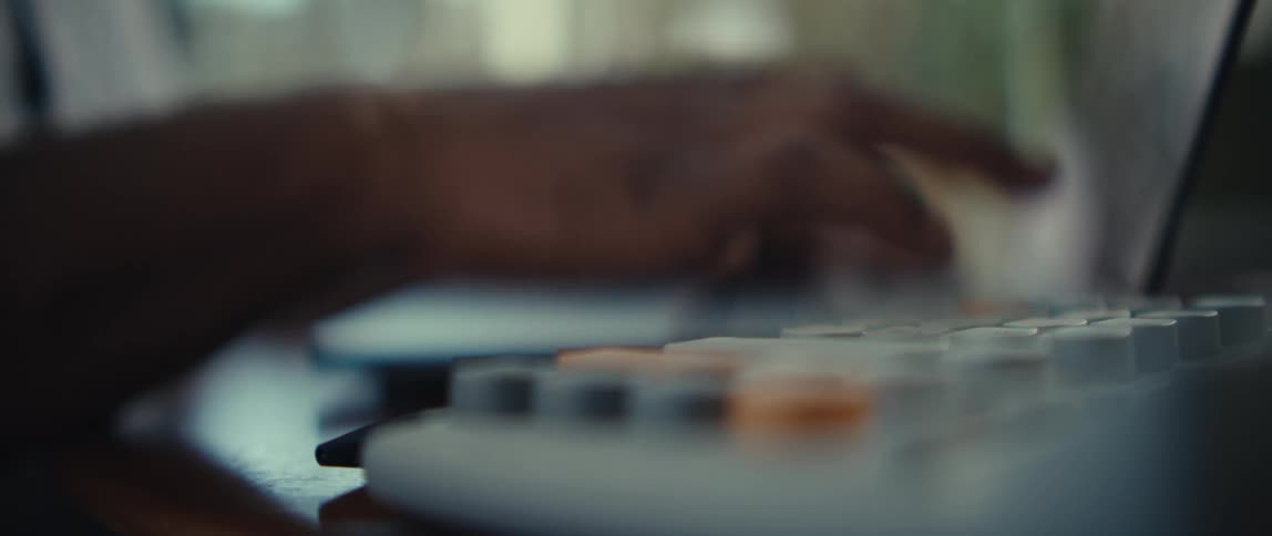 A person typing on a laptop