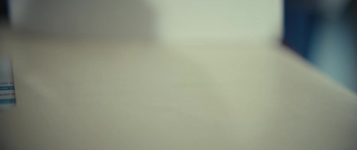 Document with green bar chart in close focus