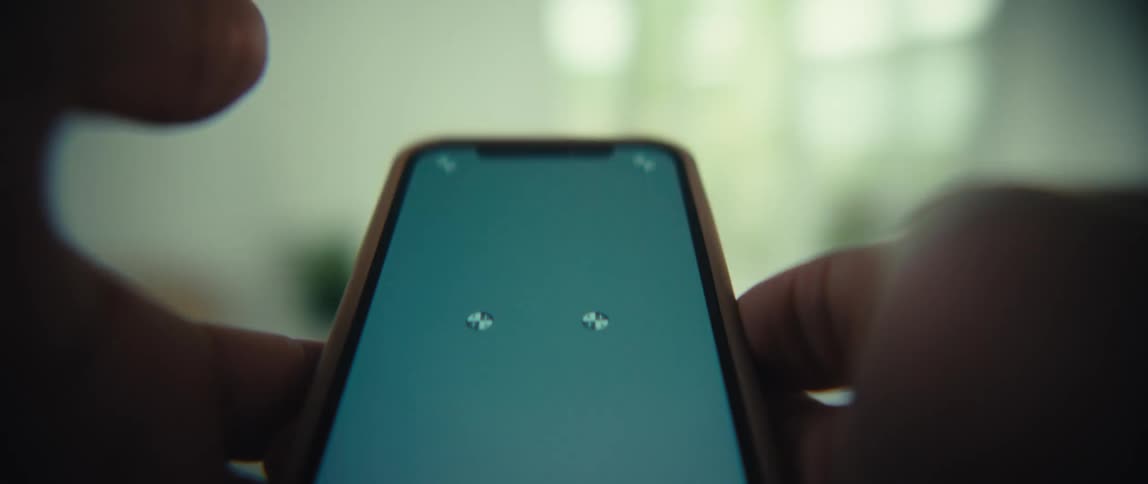 Hands holding a smartphone