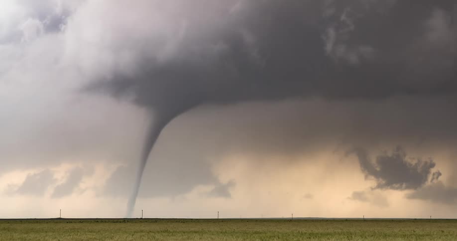 A tornado outdoors in a field