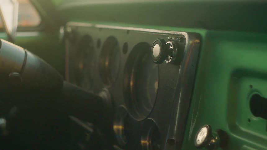 Sun shines and reflects on a car dashboard