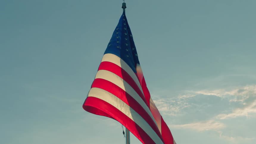 American flag waving in the sunlight