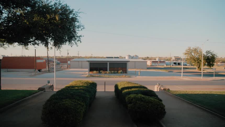 A view of a parking lot in a suburb