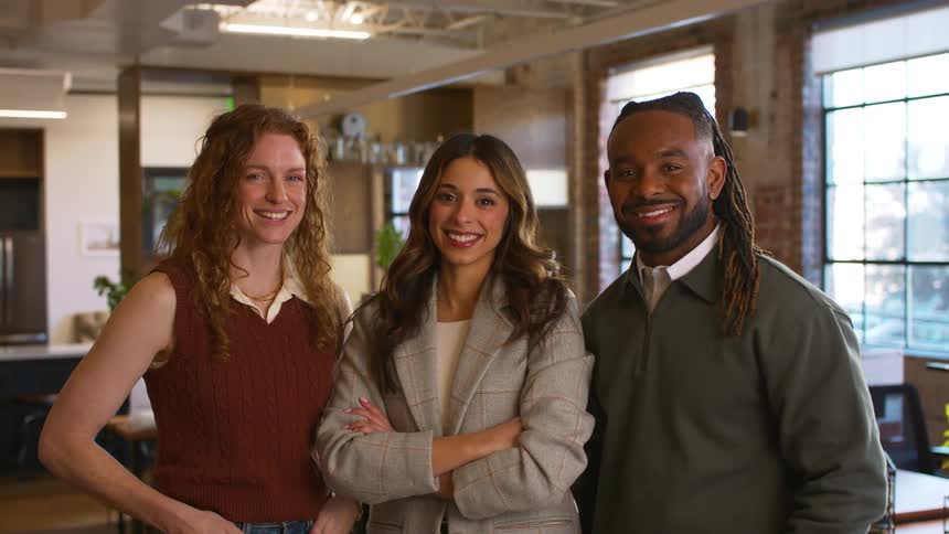 A portrait of a man and two women
