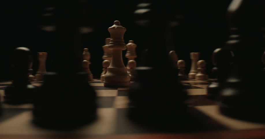 The single chess piece is surrounded with others on both sides