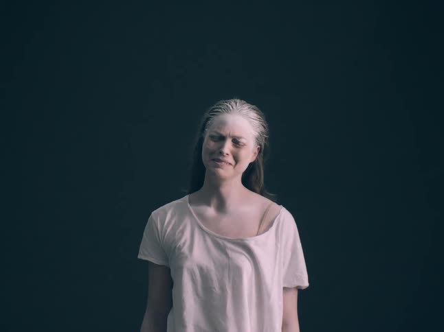 A portrait of a woman crying