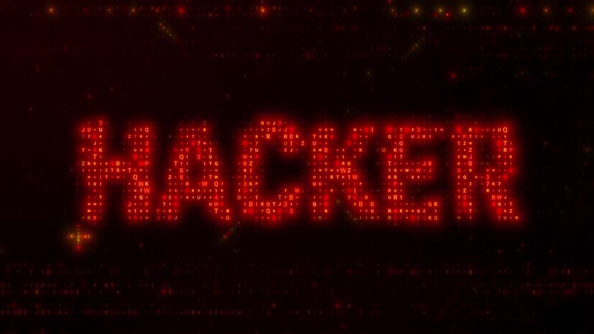 The word hacker appears in bright red digital characters and symbols that flicker and shift against a dark background with scattered glowing orange and red light particles