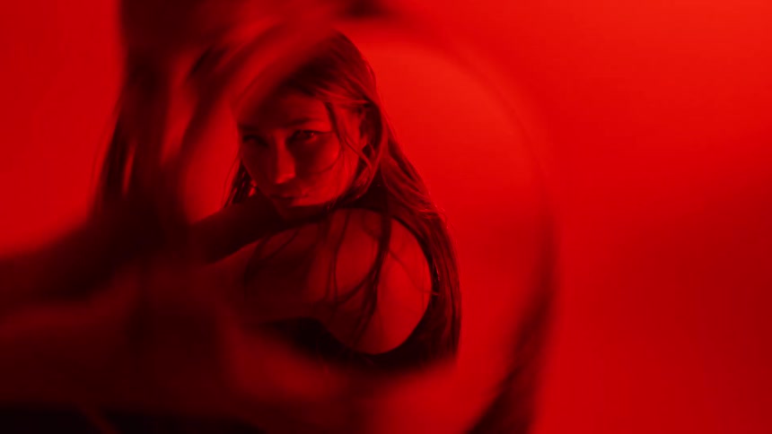 A portrait of a woman in a room