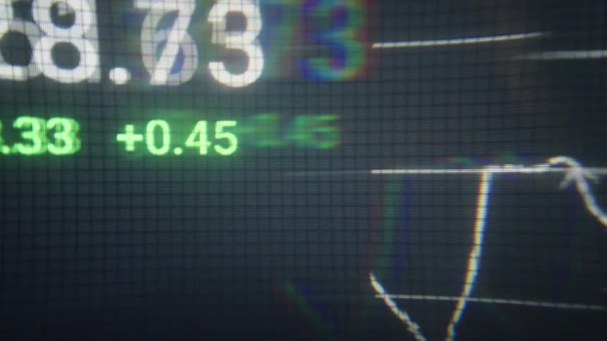 Charts are flashing on the computer screen