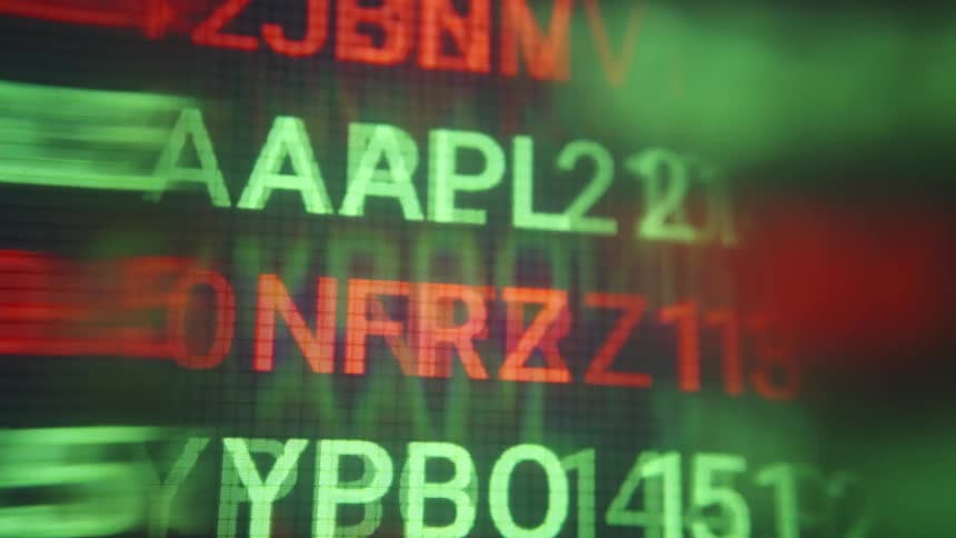 The stock ticker is red and yellow in color