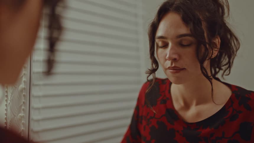 A portrait of a woman in a room