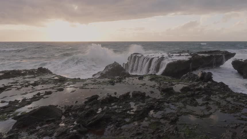 Some waves crashing on the shore