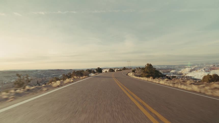 A road on a mountain with snow