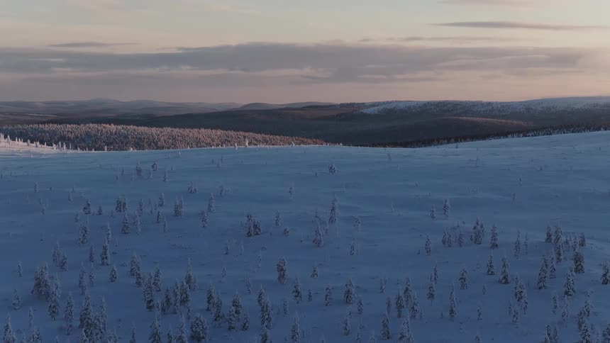 The landscape is covered with heavy snow