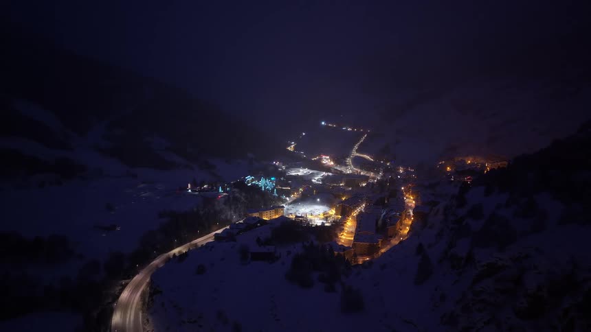 A city is tucked in between mountains
