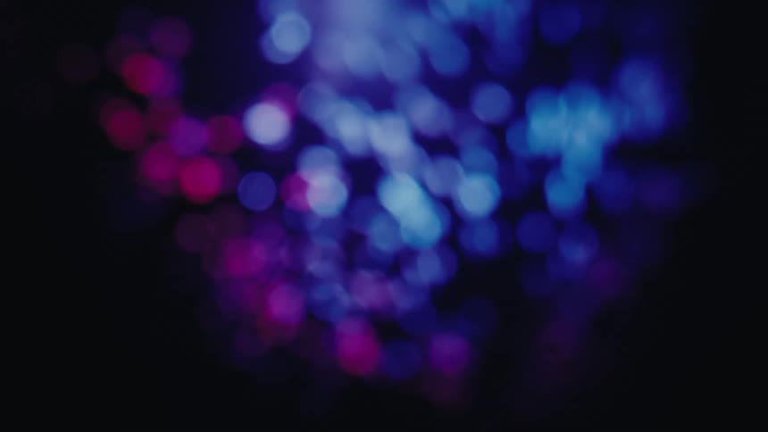 Outoffocus light points in blue and green tones forming an abstract pattern