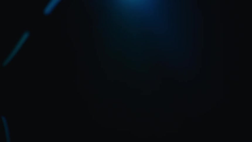 Abstract blue and teal light trails dance across a dark void with heavy motion blur and soft bokeh