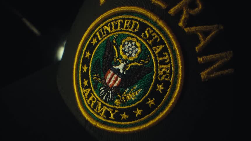 Black cap with veteran embroidery and united states army emblem