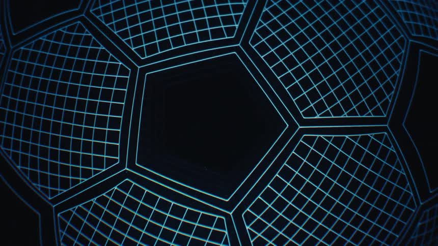 Outline of a digital soccer ball changing colors on a black screen