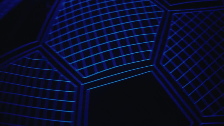 A view of a digital soccer ball that is blue and black