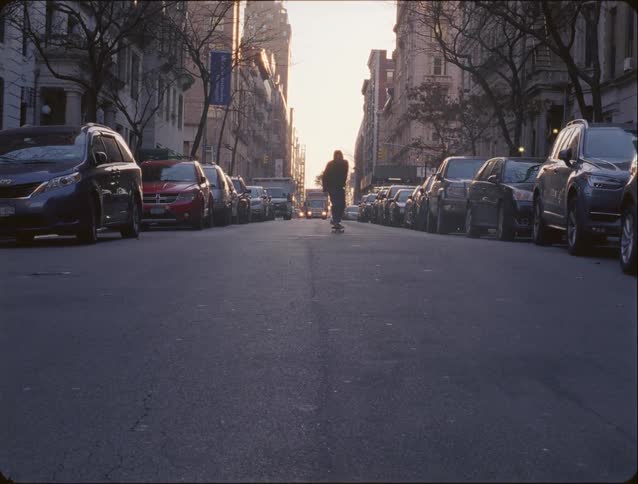 A person skateboarding out in a city