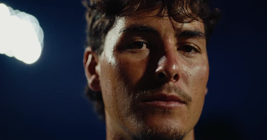Closeup crying face of a man standing outdoor at night