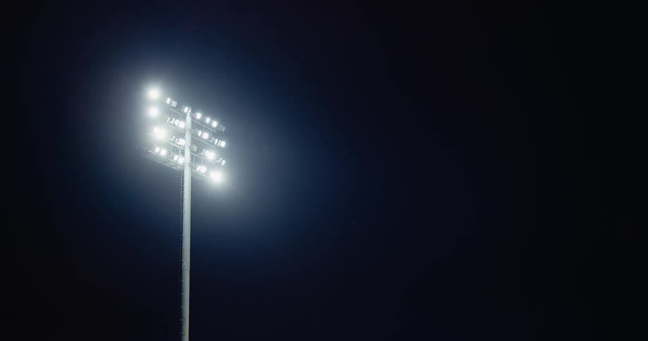 Floodlight on a light pole outdoors at night time