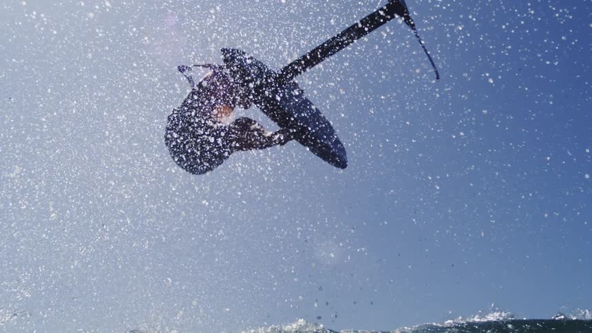 A man surfing on a large wave