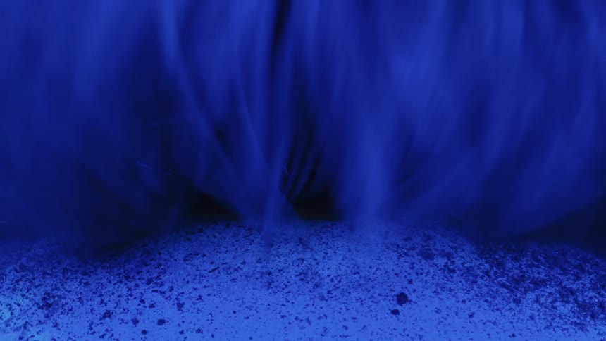From a perspective atop the vehicles roof the camera captures spinning brushes and soapy jets engulfing the mudcaked surface as the suv moves through the wash tunnel