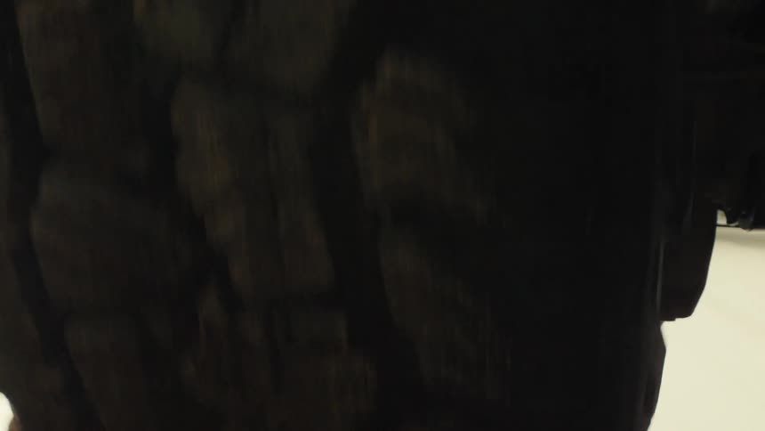 Wheel of a moving vehicle with a tire full of mud
